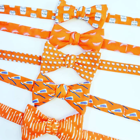 orange dental and orthodontist themed bow ties
